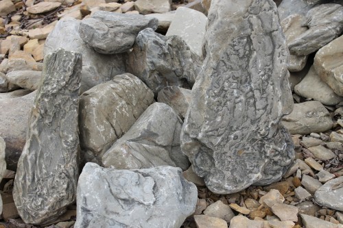 Песчаник декоративный ландшафтный (фр. 300-500 мм)  купить  в Ростове песчаник желтый рыжий серый зеленый валун речной окатанный природный песчаника 4 500 руб/т   фото 