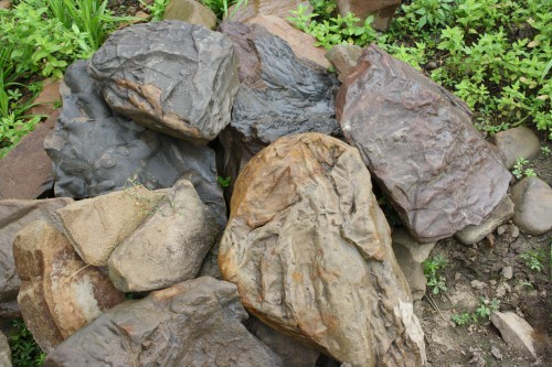  Песчаник декоративный ландшафтный (фр. 300-500 мм)  купить  в Ростове песчаник желтый рыжий серый зеленый валун речной окатанный природный песчаника 4 500 руб/т   фото 